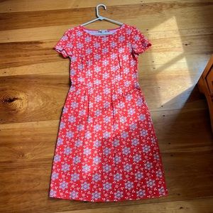 Boden Dress. Coral color with flower designs. Like new. Size US 4R